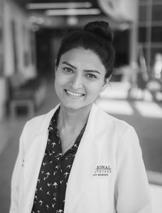 Toishi  Sharma,  M.D. 